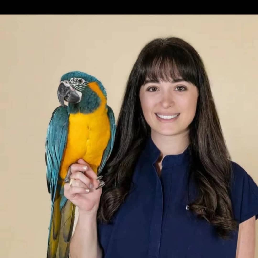 Dr. Rawlings with her macaw